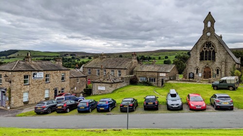 Sheep walking along the road in the Yorkshire Dales